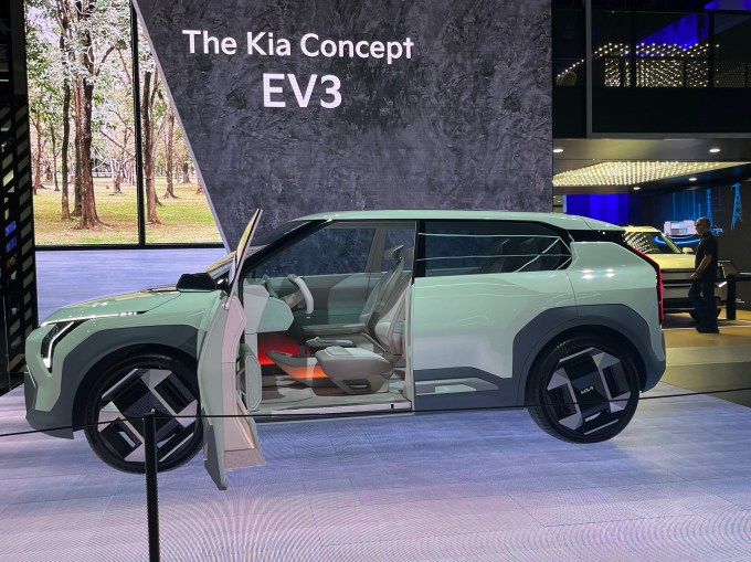 A sea foam-green Kia concept EV.