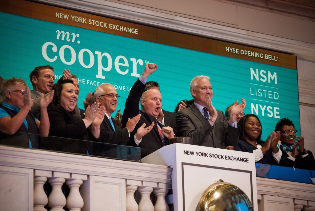 a photo of Jay Bray, the CEO of Mr Cooper Group, at the NYSE to ring the daily trading bell in 2017