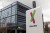 a sign outside 23andMe's office in California, featuring the company's office in the background