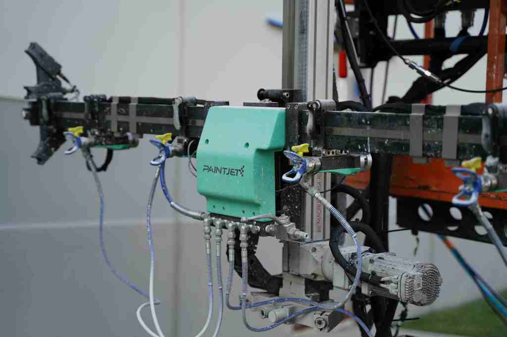 close up of robotic paint mechanism
