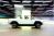 A 2024 Hummer EV SUV carrying attendees rounds a corner of a test track during the North American International Auto Show at the Huntington Place convention center in Detroit, Michigan, on September 14, 2023.
