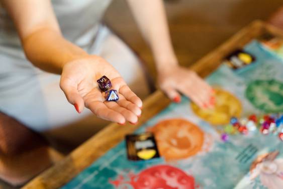 board game player holding dice