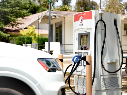 An EV charger located in a parking lot.