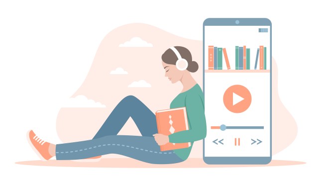 A young woman in headphones with a book sitting near a large smartphone with an audiobook app on the screen.