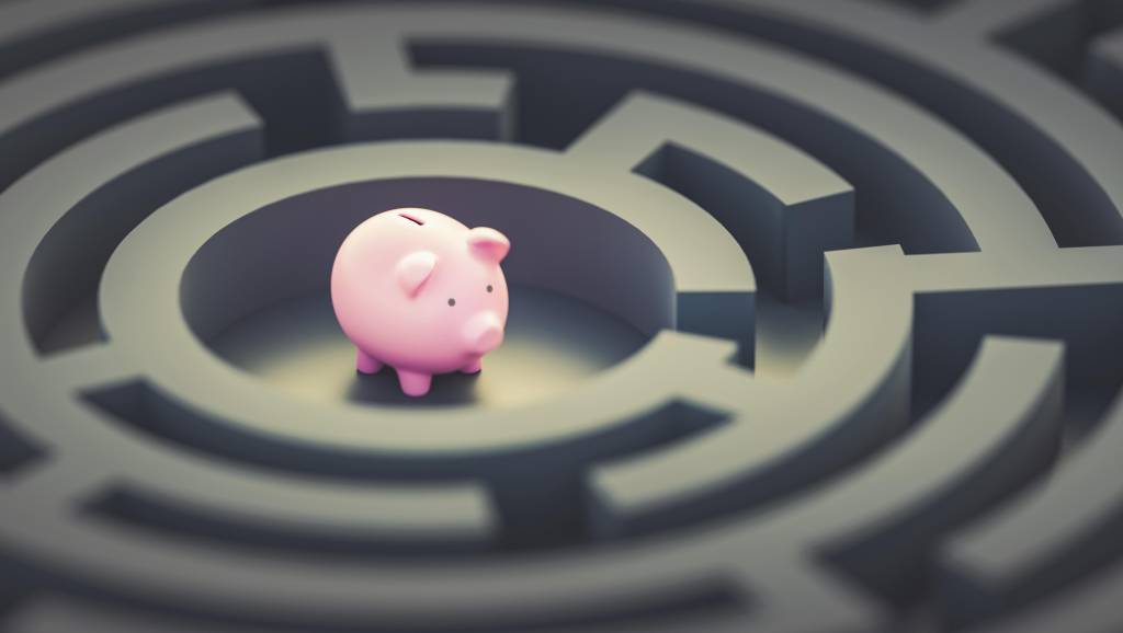 Piggy bank sits in the middle of a circular maze.