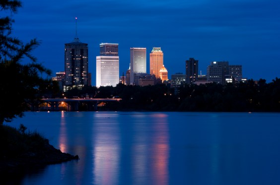 The downtown Tulsa Skyline from across the Arkansas River at dusk.