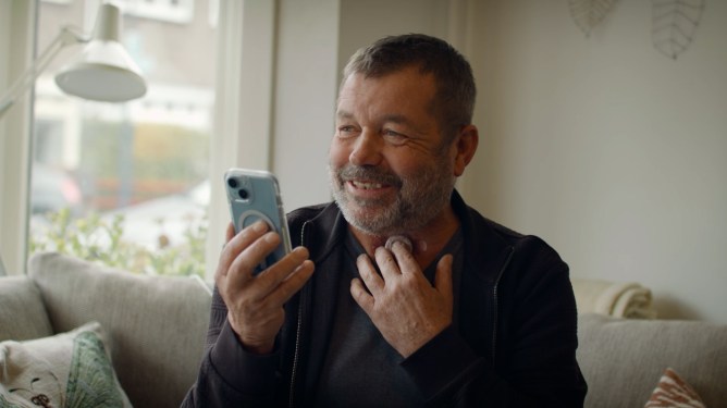 man holding cell phone