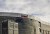 a building featuring Ivanti's logo in red on the top of the building