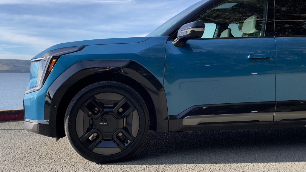 kia ev9 close up press drive