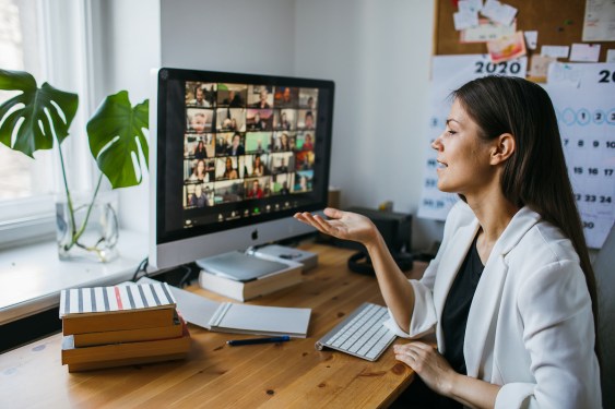 young woman having Zoom video conference call via computer. Zoom Call Meeting. Home office. Stay at home and work from home
