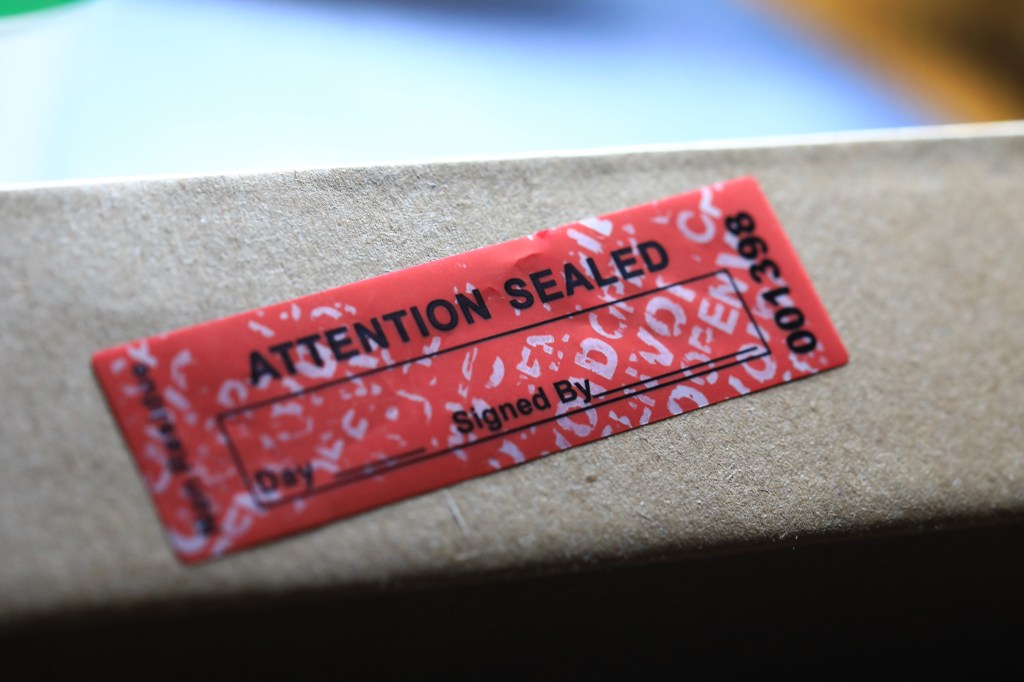 tampered label with void text