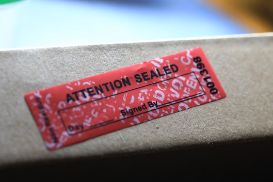tampered label with void text