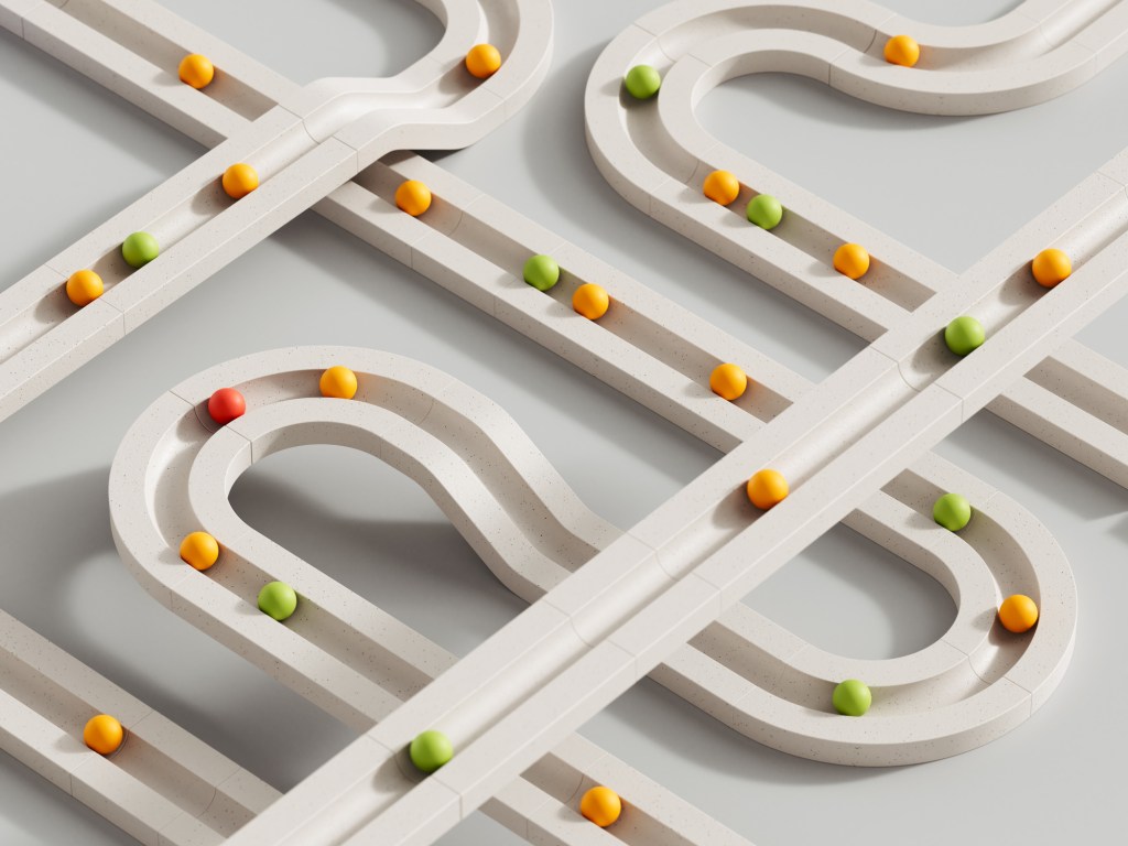 Digitally generated image of rolling objects that follow a set path.