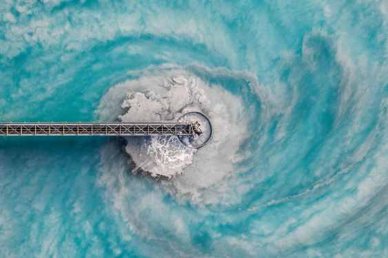 Water swirls inside a treatment plant.