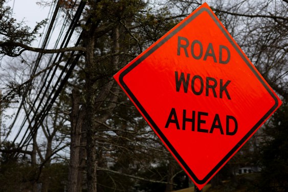 Big organge 'Road Work Ahead' sign
