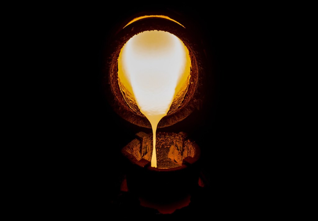 Molten metal is poured into a mold.