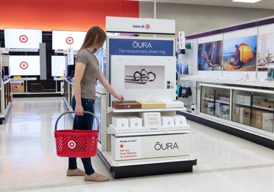 woman browsing Oura display at Target