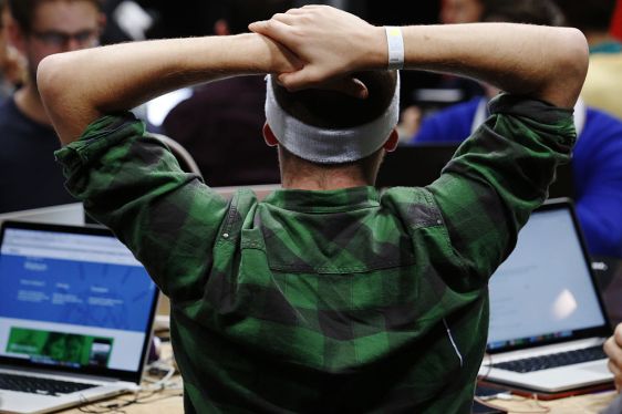 Developer participating in a hackathon at a TechCrunch event in London in 2019.