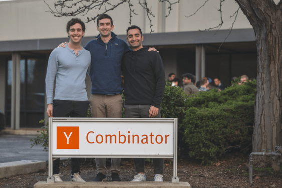 CrowdVolt-founders in front of Y Combinator sign
