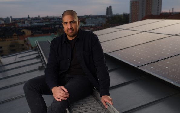 Tanmoy Bari, CEO and co-founder of Swedish energy-tech startup Greenely sitting on a solar panelled roof