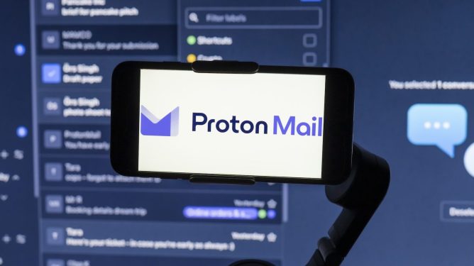 ProtonMail logo displayed on a mobile phone screen