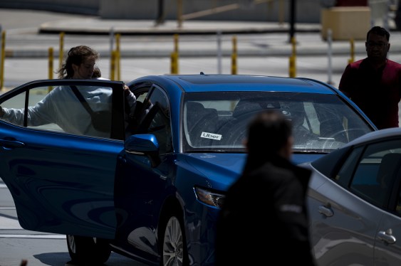 Uber signage on a vehicle at San Francisco International Airport.