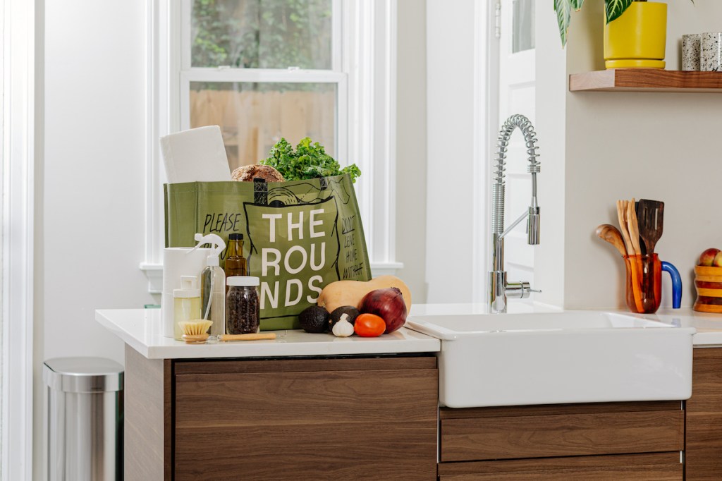 The Rounds' bag of groceries on kitchen counter