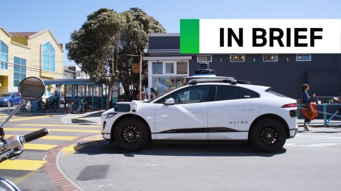 White Waymo robotaxi