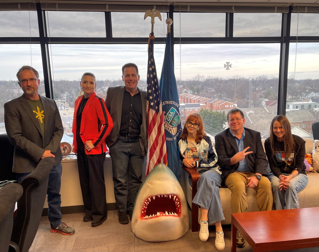 a photo of Mudge, Lesley Carhart, Ray Watson, Jake Williams, Jen Easterly, and others at CISA's headquarters in January 2024.
