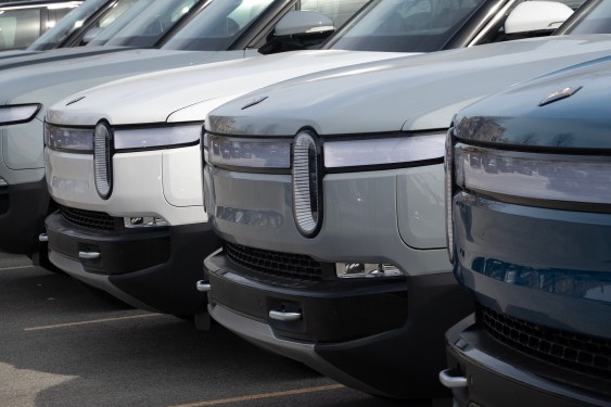 Rivian electric vehicles sit in a lot at a Rivian facility in February 22, 2024 in Chicago, Illinois.