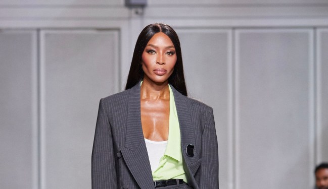 Naomi Campbell wearing a Humane pin