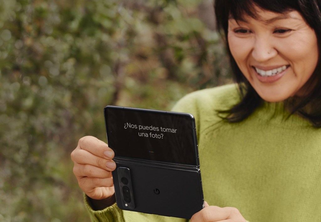 Woman looking at Google Pixel Fold