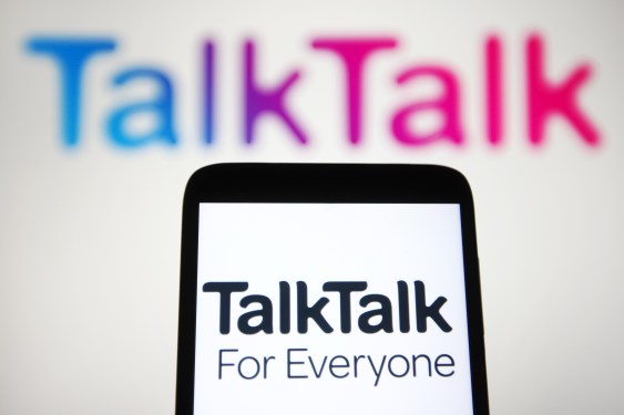 TalkTalk Telecom Group plc (or TalkTalk Group) logo is seen on a smartphone and a pc screen.