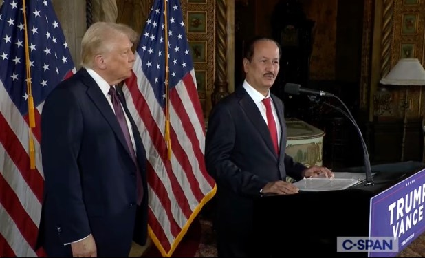 a screenshot of a CSPAN feed showing Trump next to billionaire Hussain Sajwani at a podium in Mar-a-Lago