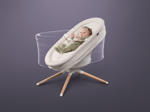 baby in an Elvie smart bouncer/bassinet