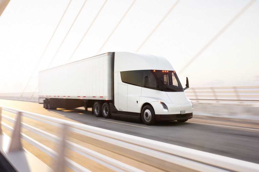 Tesla Semi driving across a bridge