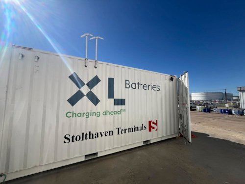 A shipping container holds XL Batteries' demonstration battery equipment.
