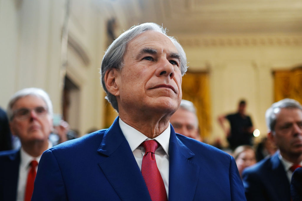 Greg Abbott, governor of Texas, as US President Donald Trump, not pictured, speaks before an executive order signing in the East Room of the White House in Washington, DC, US, on Thursday, March 20, 2025. The order directs the secretary of education to take steps to close the department and "return education authority to the States," according to a White House fact sheet on the order. Photographer: Bonnie Cash/UPI/Bloomberg via Getty Images